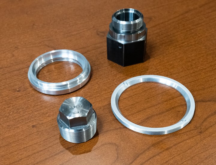 Round machined metal components
